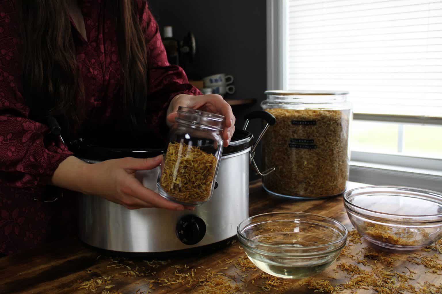 How to Infuse Herbs in Oil | Crockpot Method - Tulips and Twill