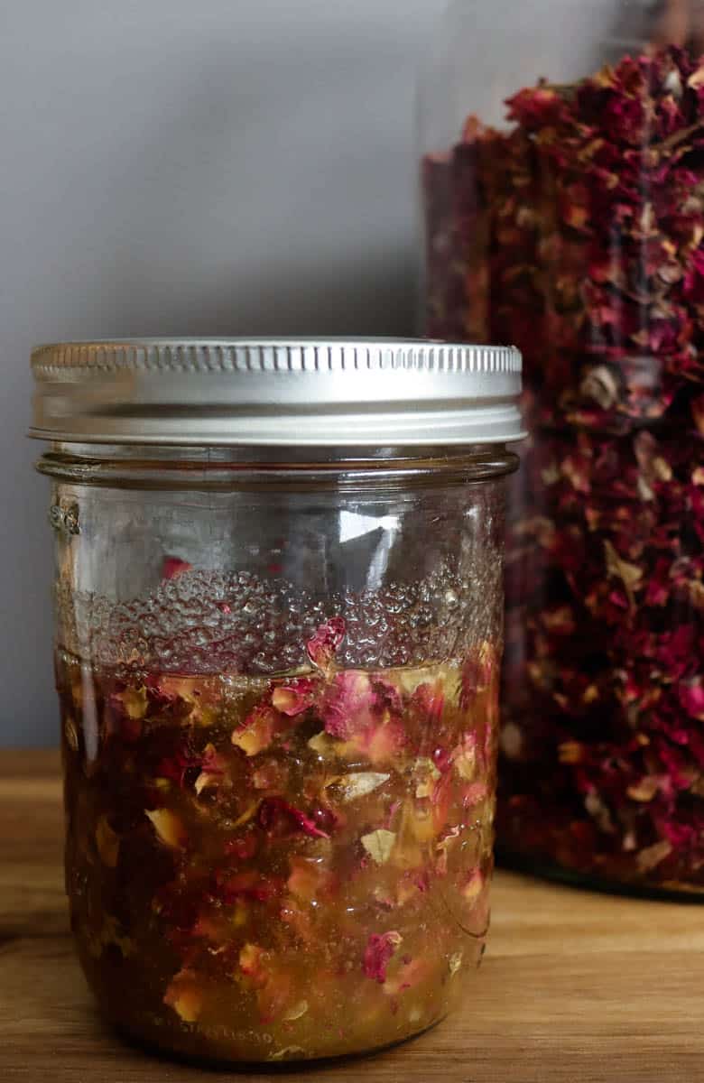 rose petals infusing in honey