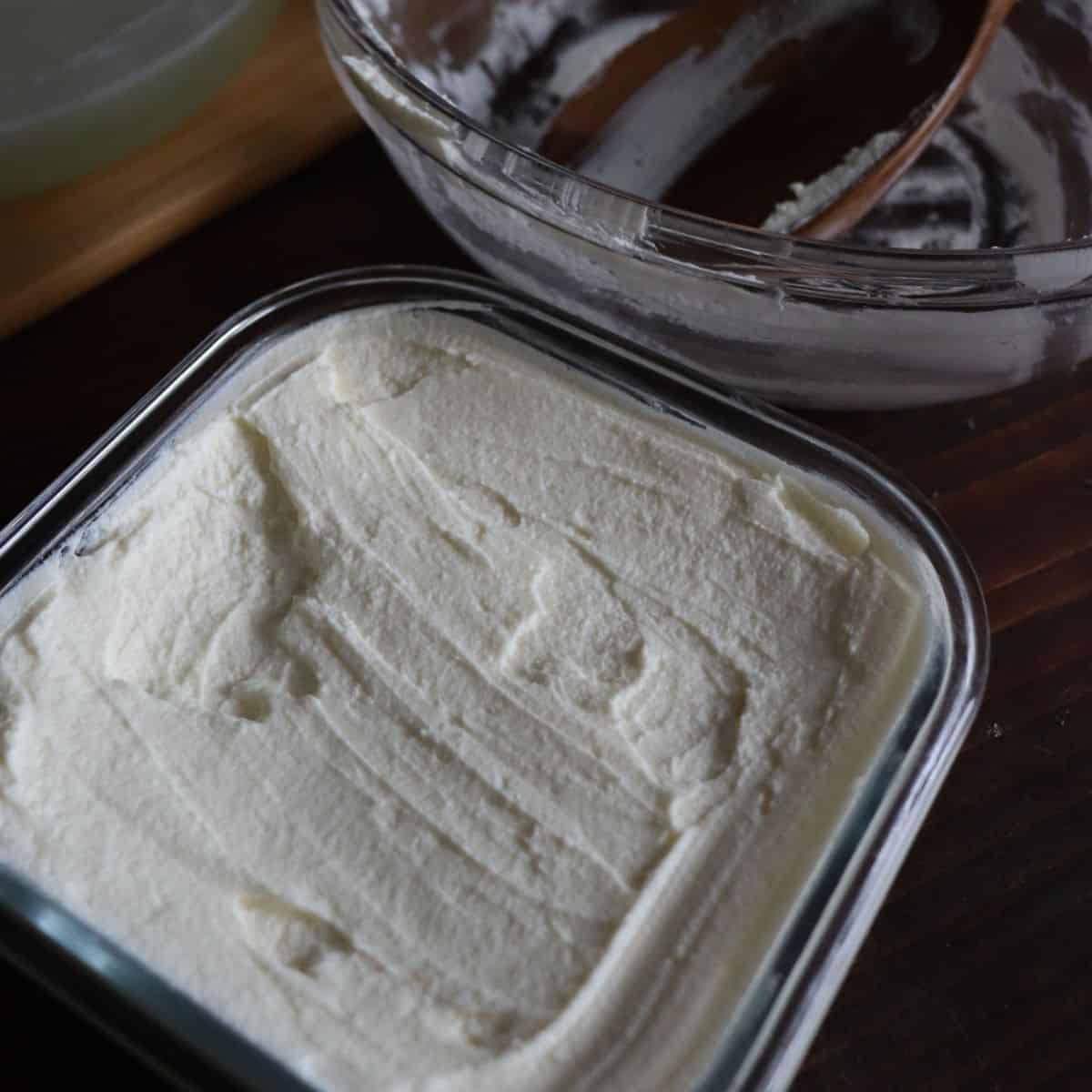 creamy cream cheese in a glass container