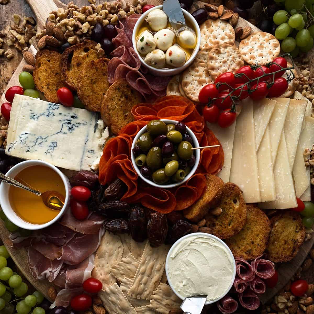 an italian style charcuterie board set up for a party